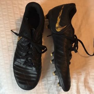 Black Nike soccer cleats. Size 8